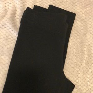 Black EXPRESS leggings with french seam down back of the leggings.